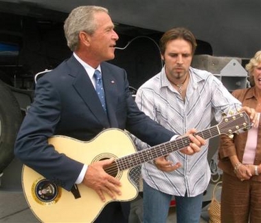 Bush fiddles while Rome floods